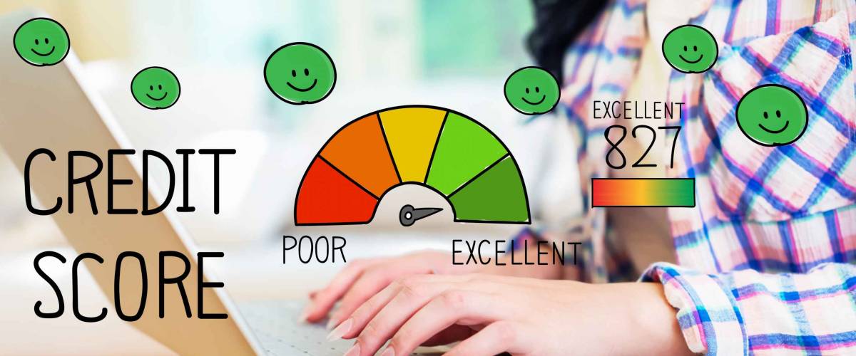 Excellent Credit Score with young woman using a laptop computer