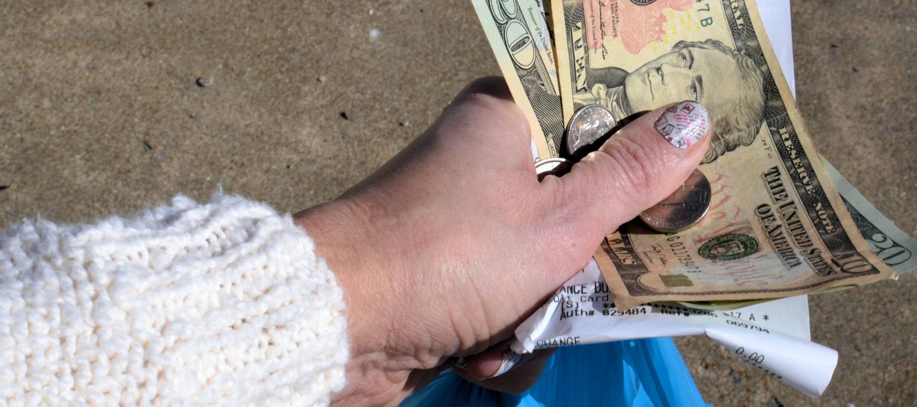 Woman holding cash