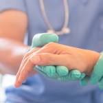 Checking a patient's pulse