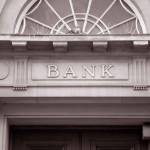 Bank Sign over Entrance Door in Black and White Sepia Tone