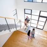 Real estate agent showing new house to couple