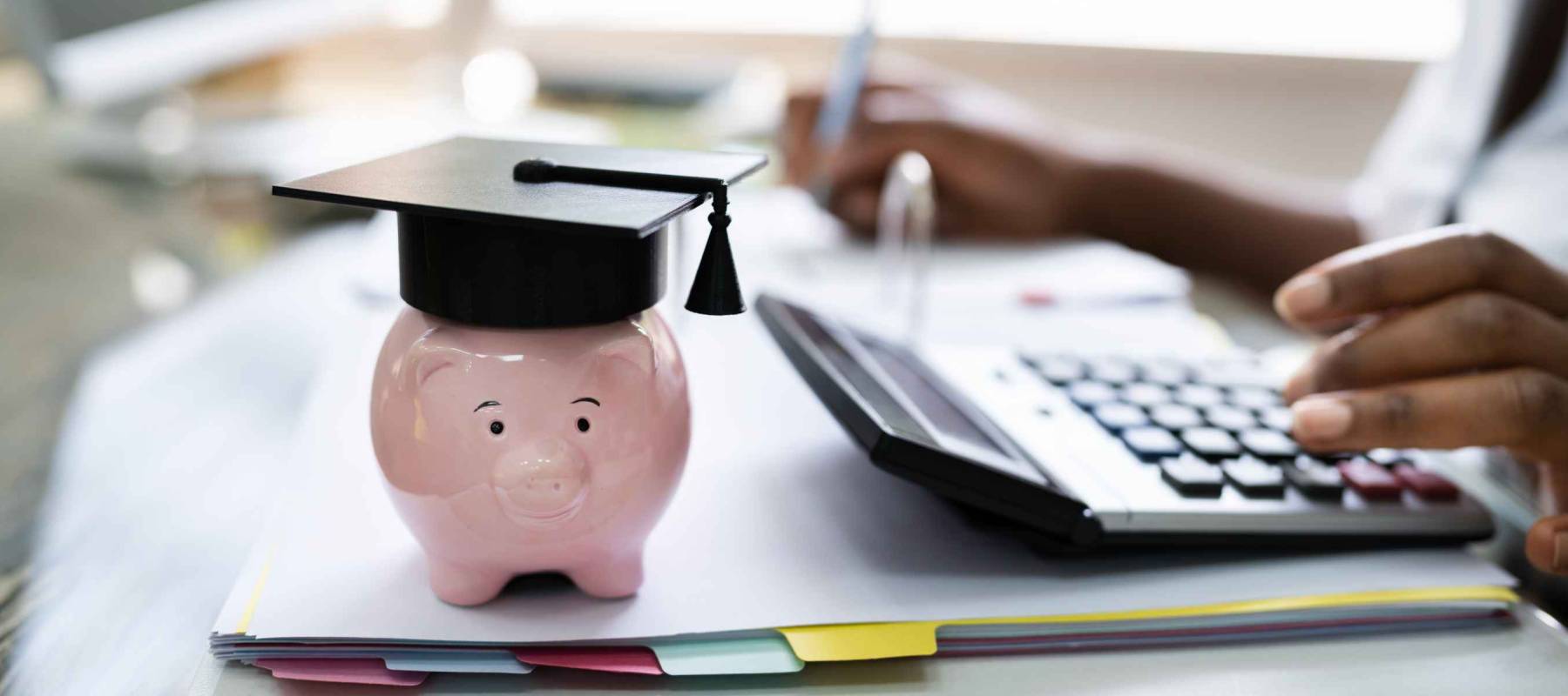 African American Women Accounting With Graduation Cap