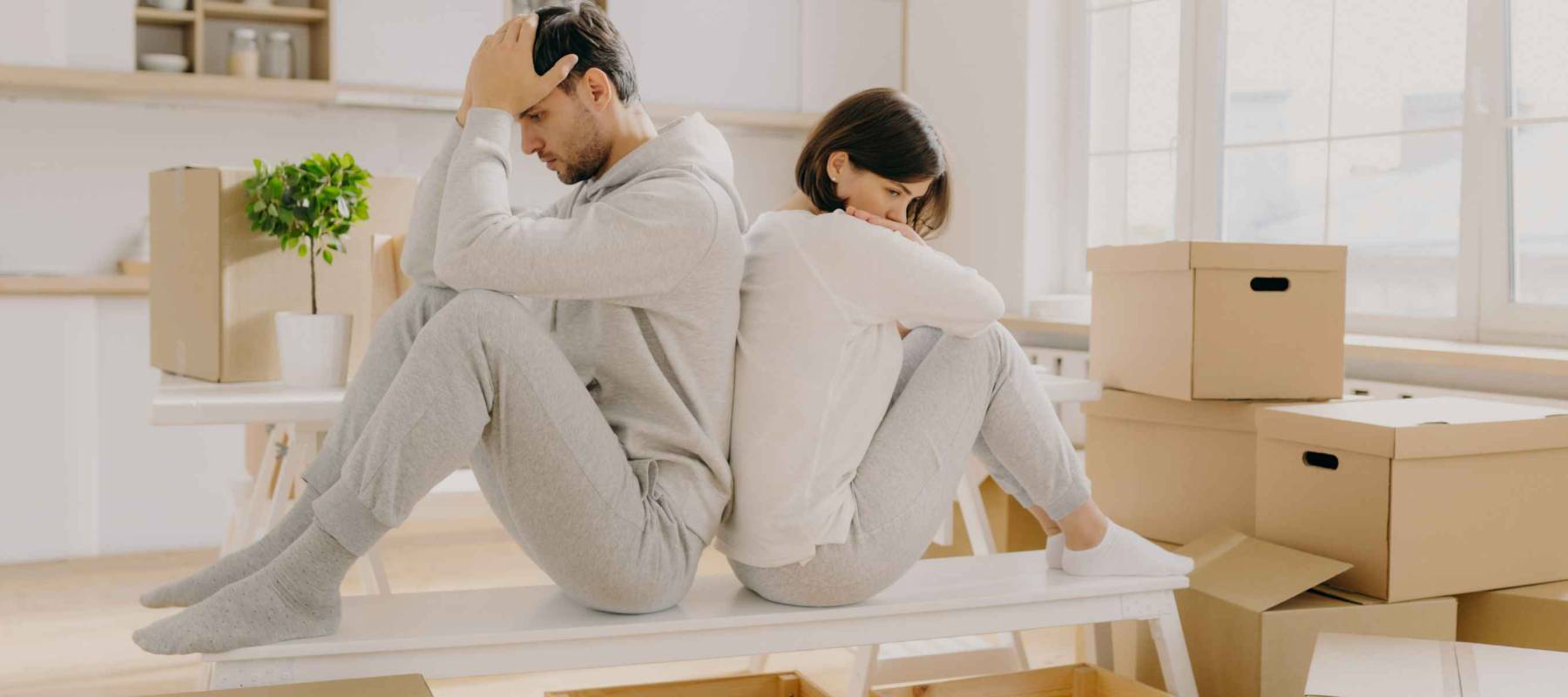 Unhappy young married woman and man have to leave house,