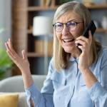 Older woman upset and talking to customer service on the phone