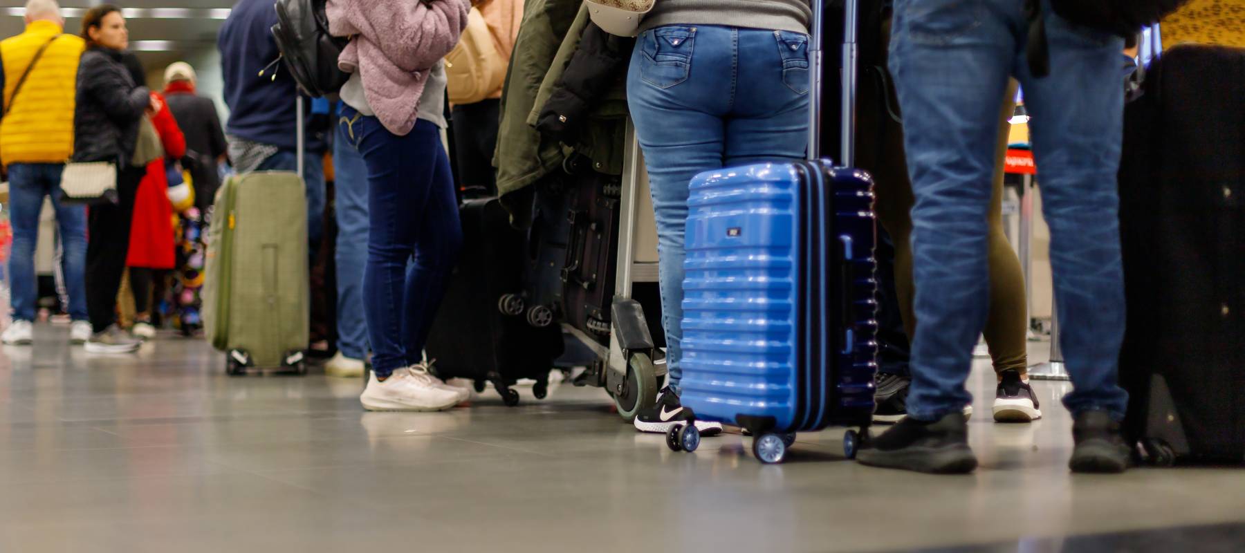 Crowds wait in line at the airport