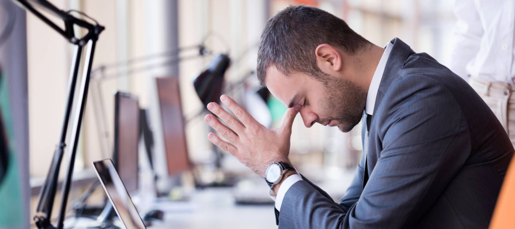 man frustrated at work