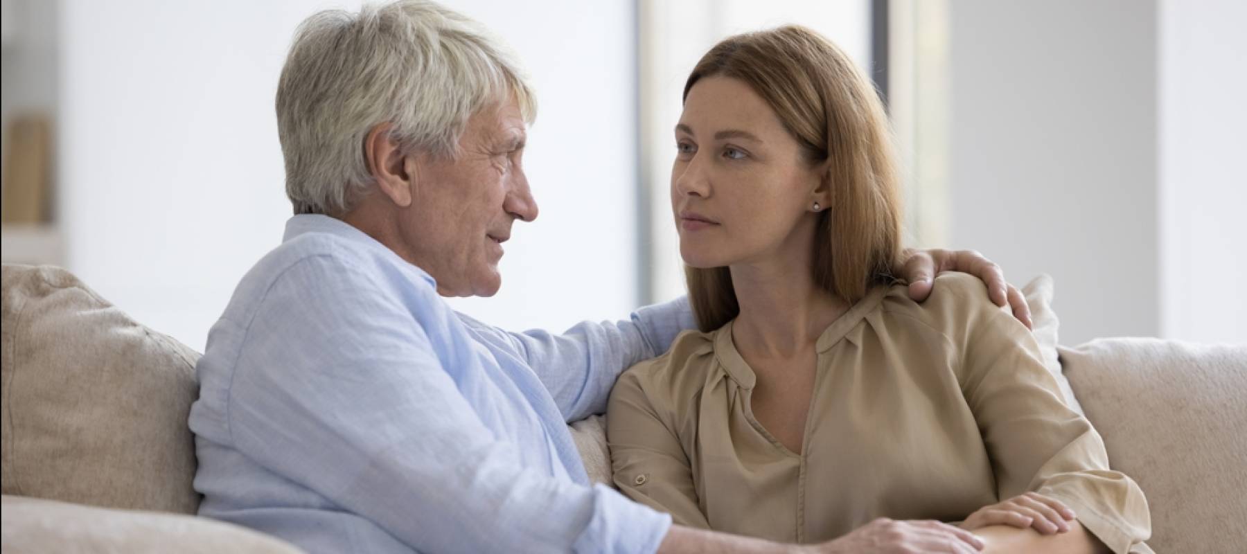 Conversation of older man and adult daughter