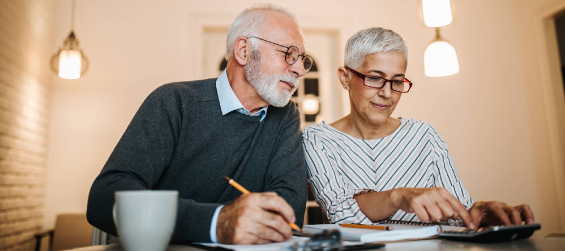 Older couple discussing paperwork