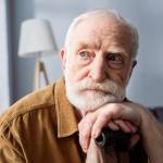 Senior man looking pensive