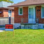 For rent sign in front of house