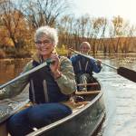 A reitred couple canoeing