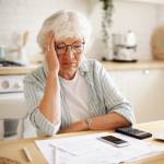 Sad frustrated senior woman