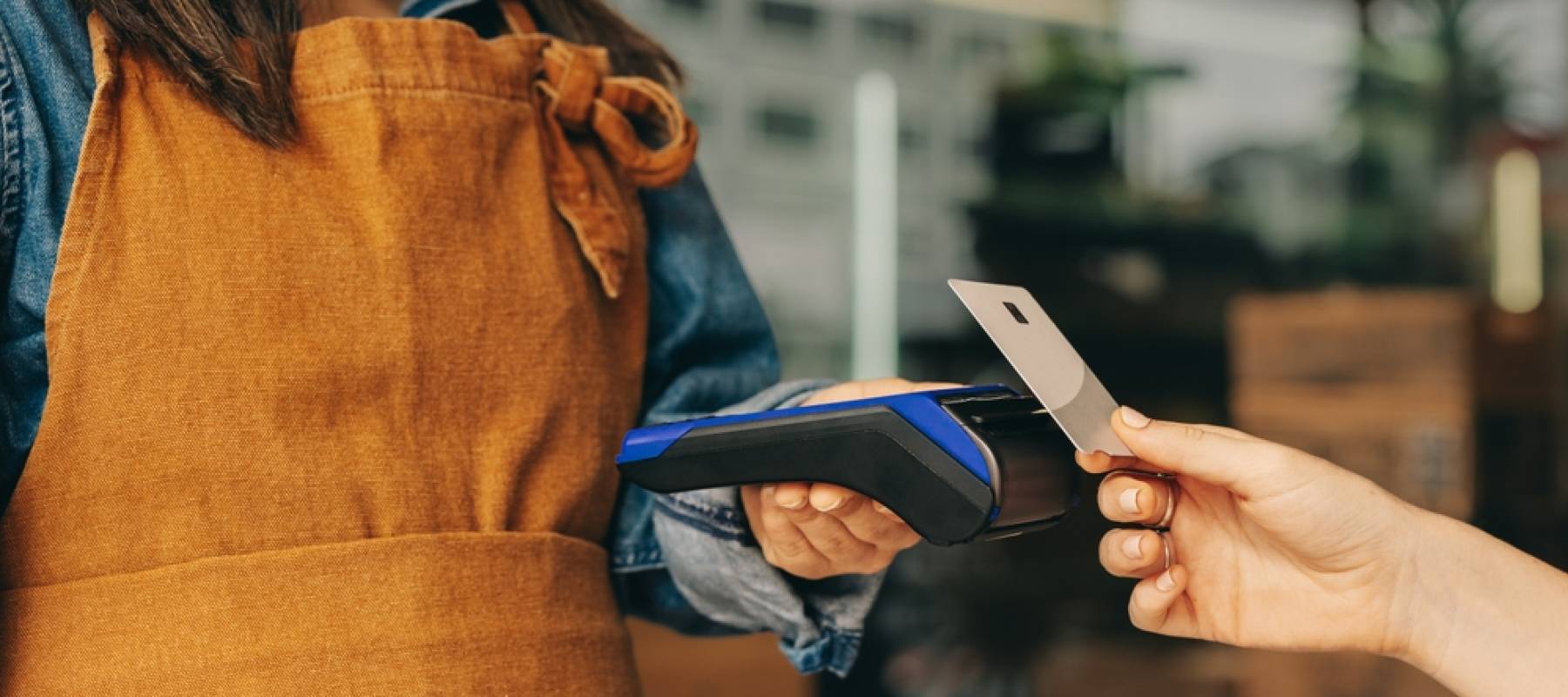 Customer paying at small business