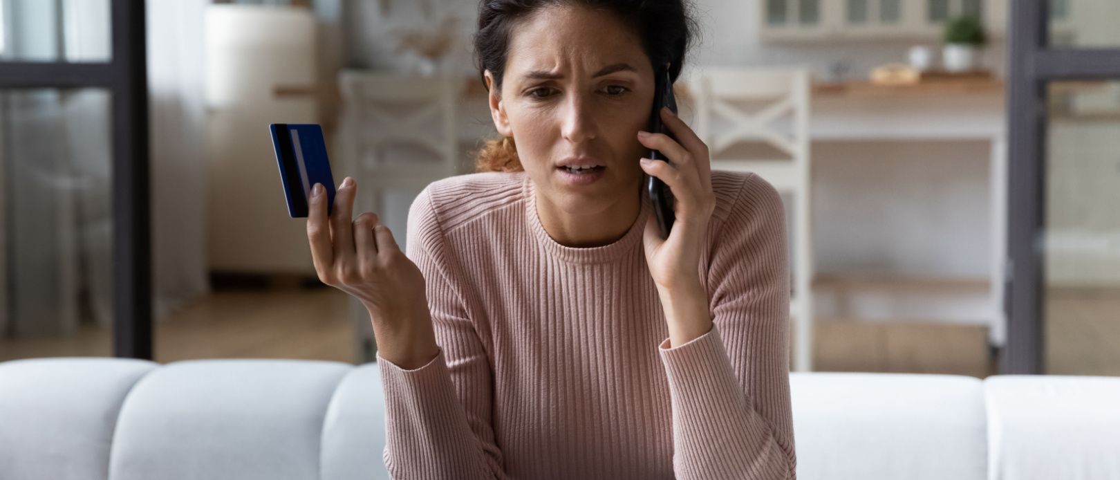 Woman looking concerned over unsecured debt