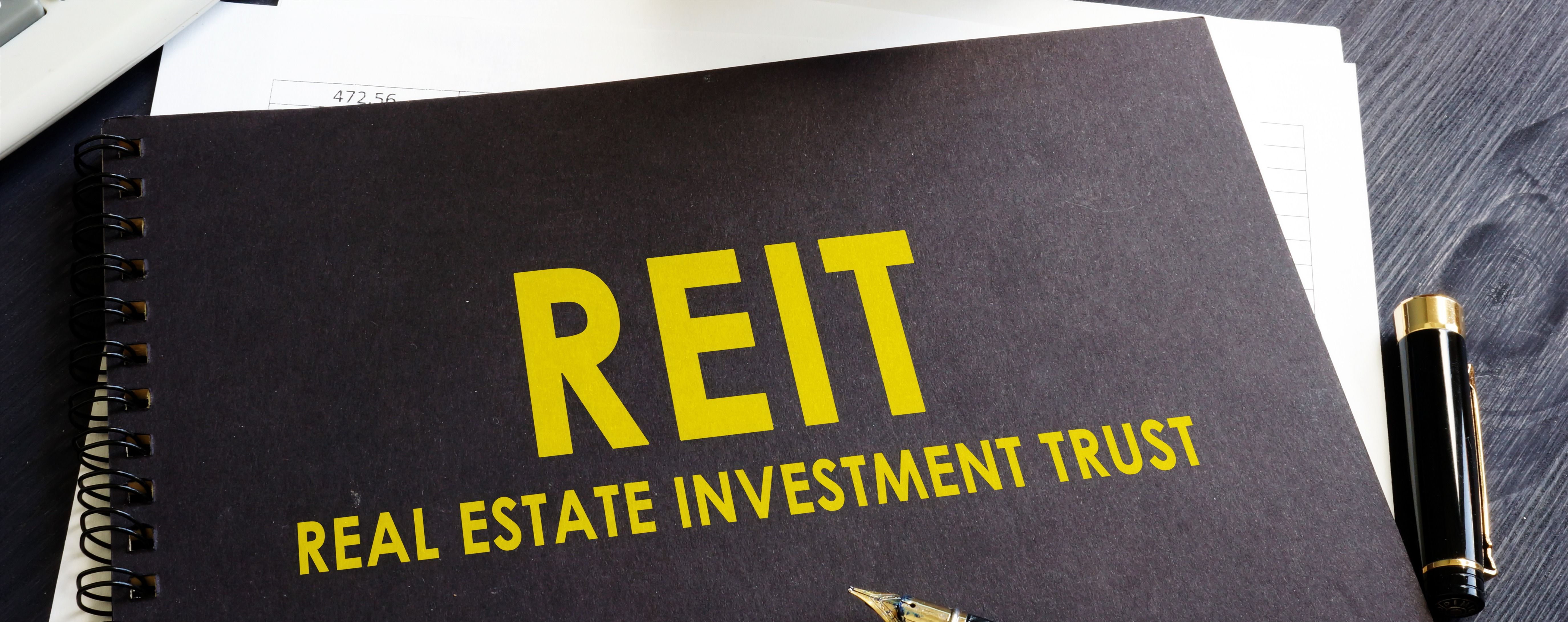 Real estate investment trust REIT on an office desk