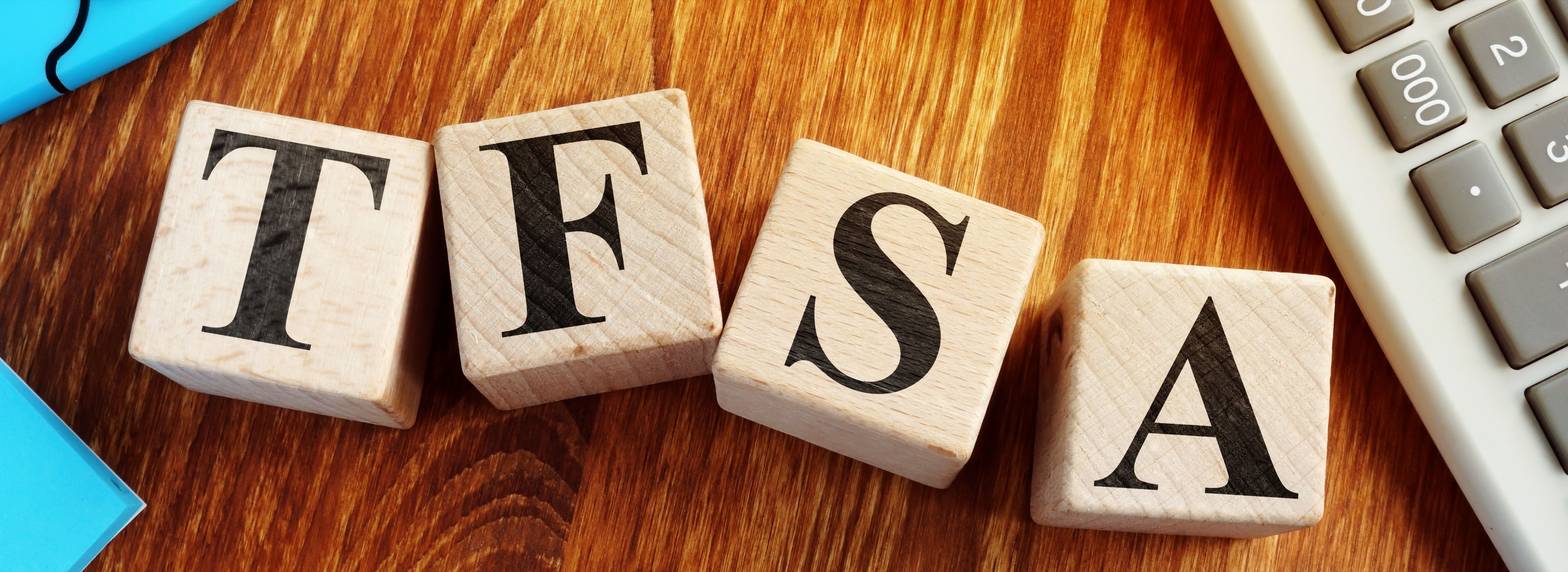 Tax Free Savings Account, TFSA spelled with wooden cubes