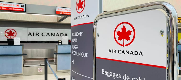 Columbus, Ohio/USA- December 2019: Air Canada baggage weighing with check in counter in the background