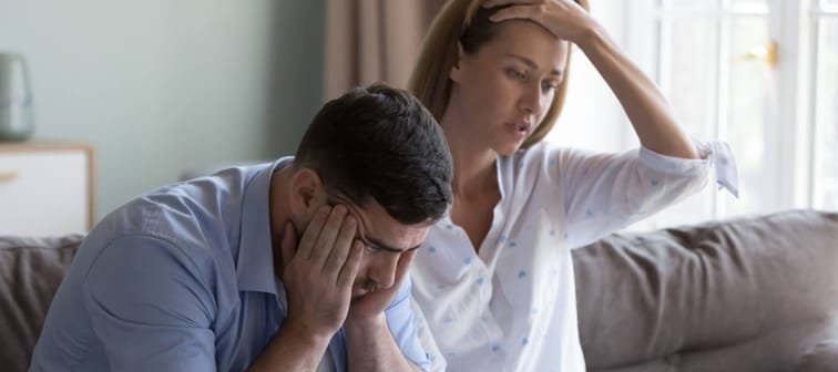 Couple looking stressed