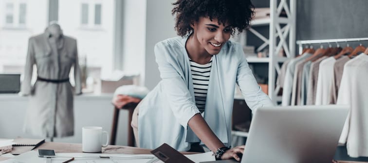 Young businesswoman looking at her computer