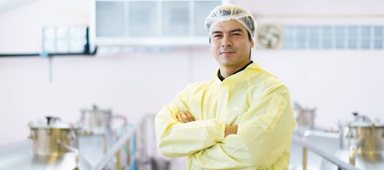 Male food worker posing for camera