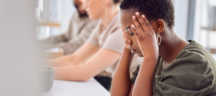 Woman is stressed at work