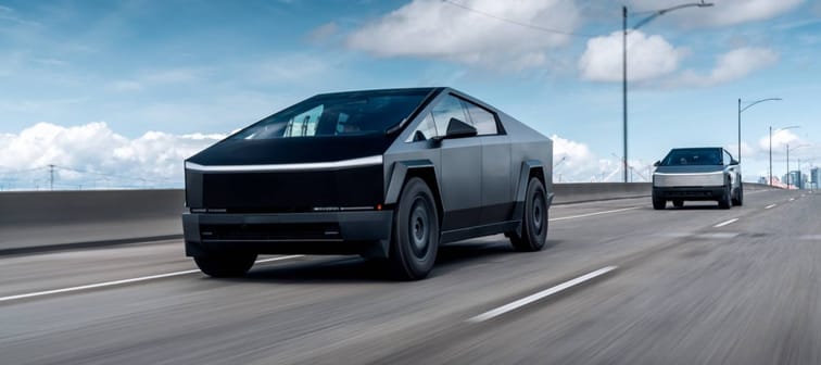 Tesla Cybertrucks driving on the highway