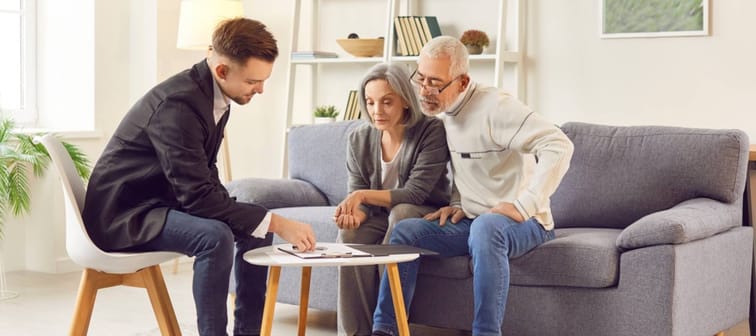 Aging couple discussing their estate planning