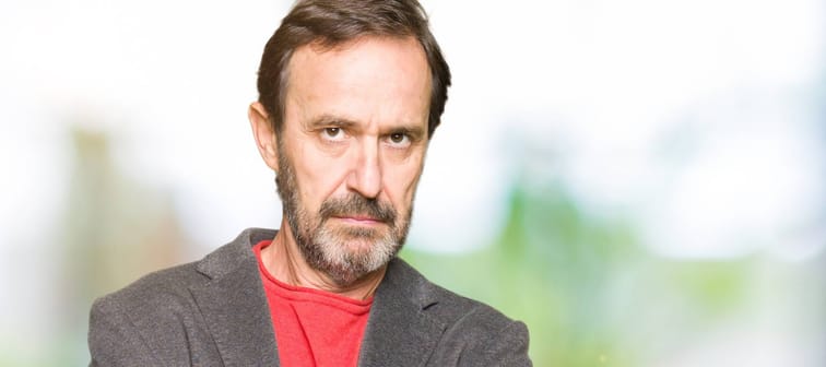 Middle age handsome business man skeptic and nervous