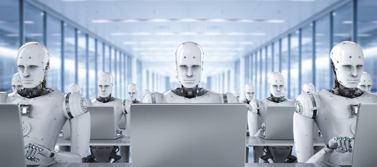 3d rendering humanoid robots working on laptop computer
