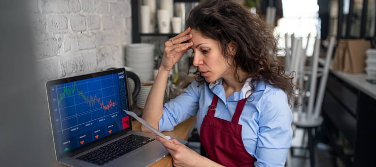 Woman concerned about poor business performance