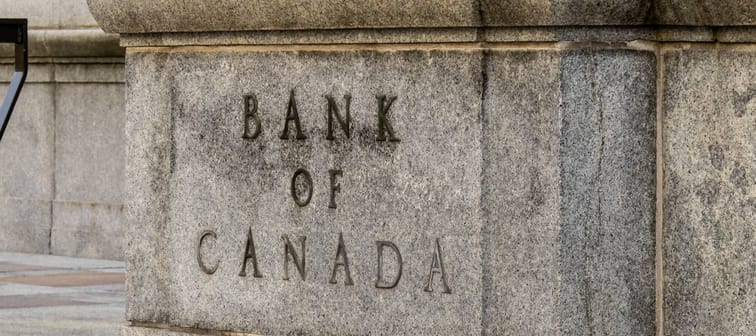Close up on details of the Bank of Canada building's facade seen from the street.
