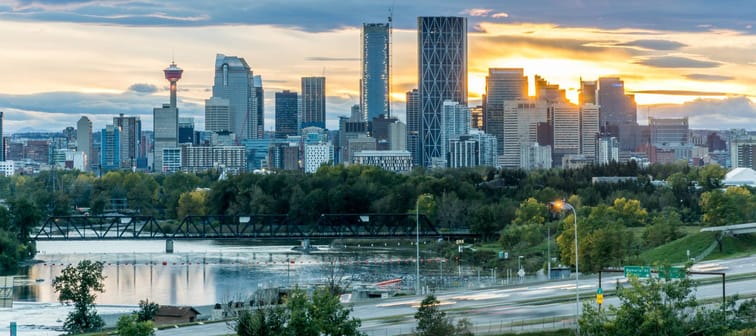 Calgary downtown in the evening at sunset with Bow River