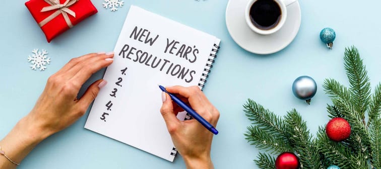 2021 New Year's resolutions with Christmas decorations. Overhead view