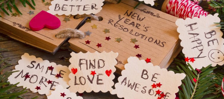 New Year's resolutions written on brown paper