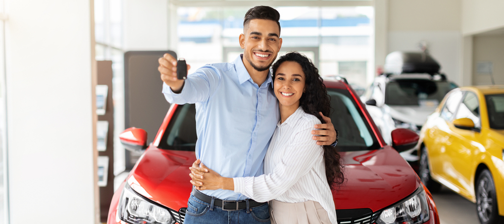 Young family buying new car
