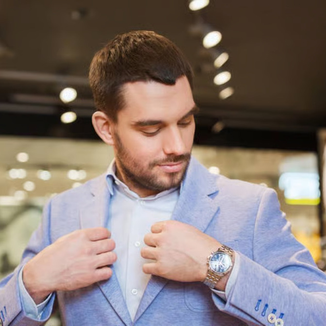 Man trying on a sport jacket