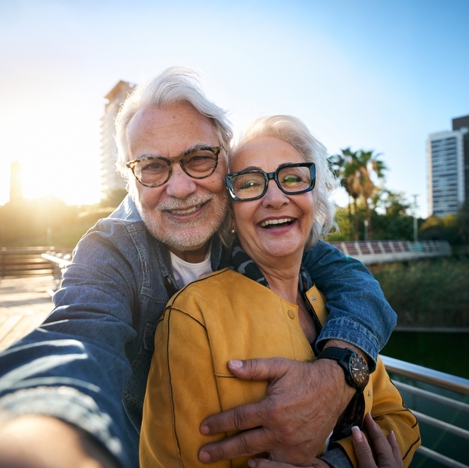 Retired white couple taking a selfie