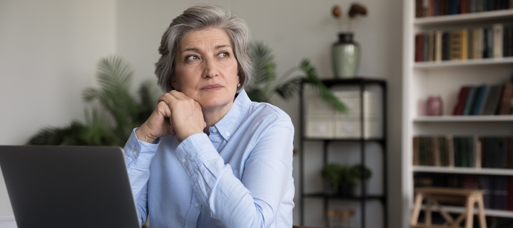 Pensive middle-aged woman