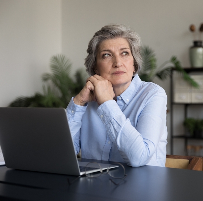 Pensive middle-aged woman