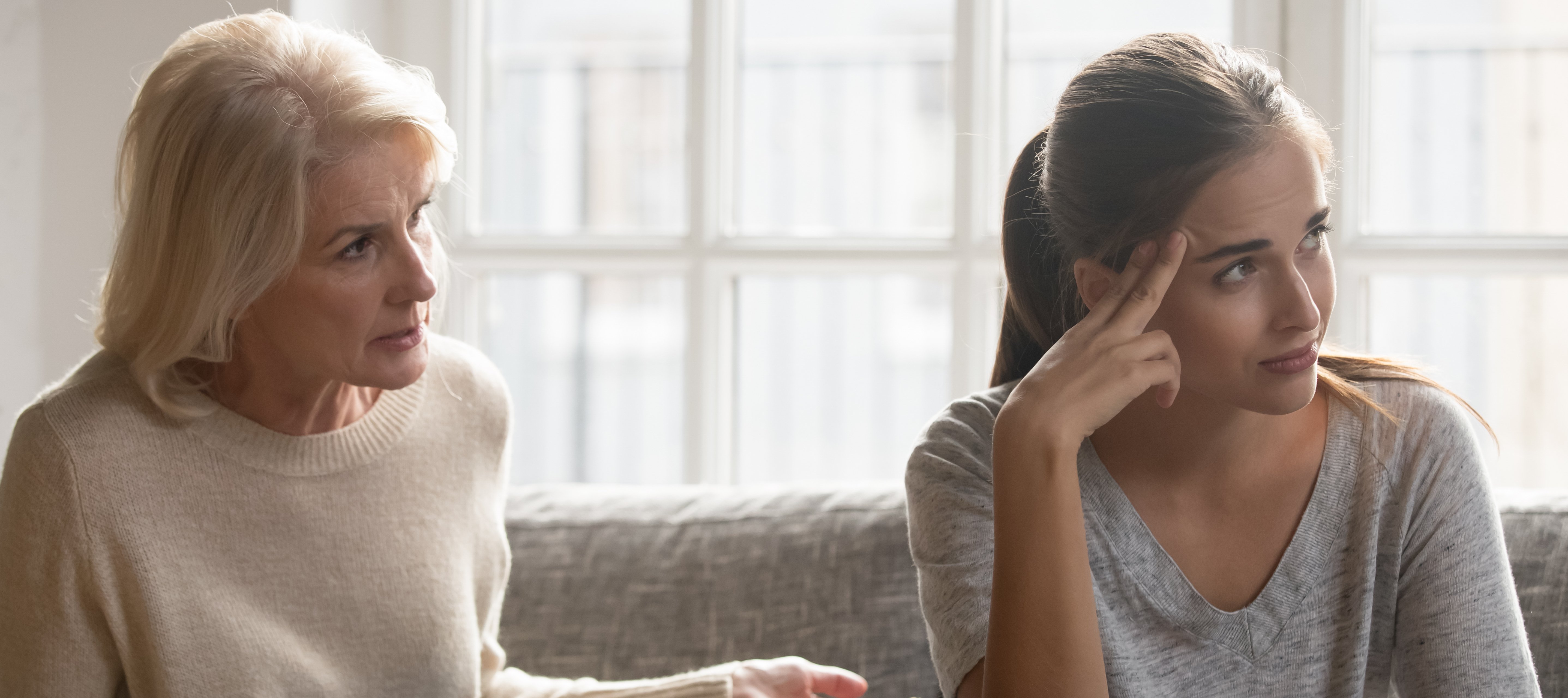 Mother and adult daughter arguing