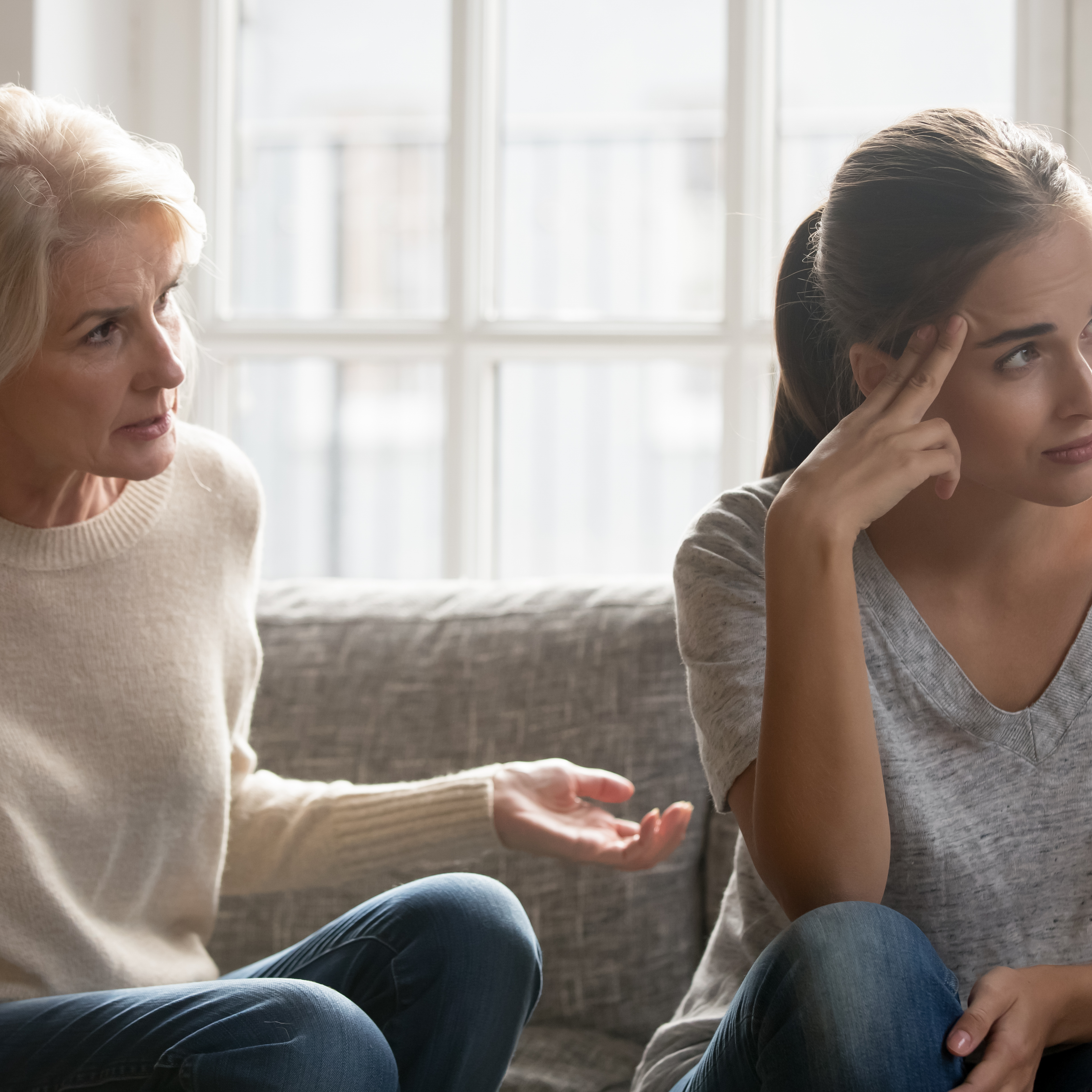 Mother and adult daughter arguing