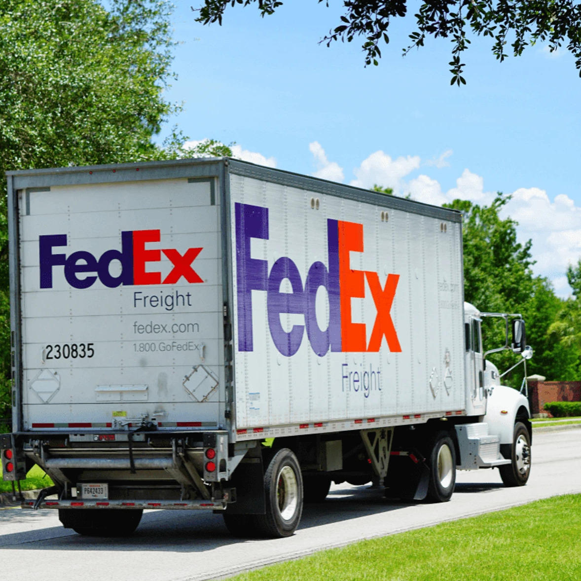 Photo of hubcap and FedEx vehicle
