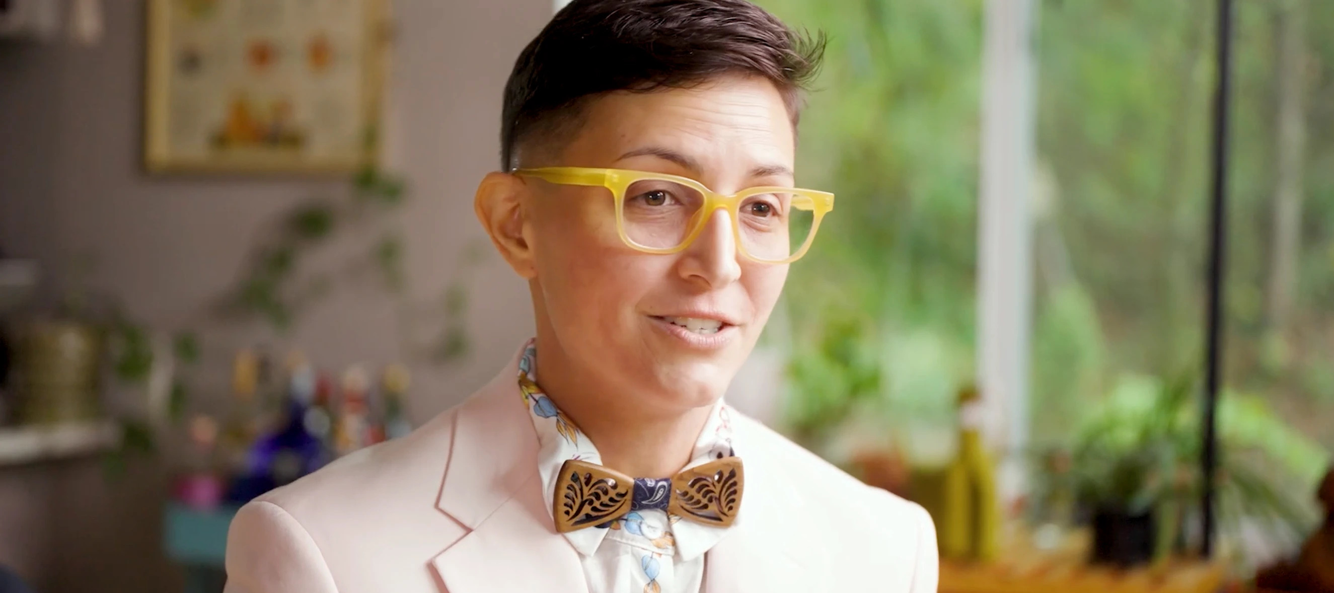 Photo of a financial professional in yellow glasses