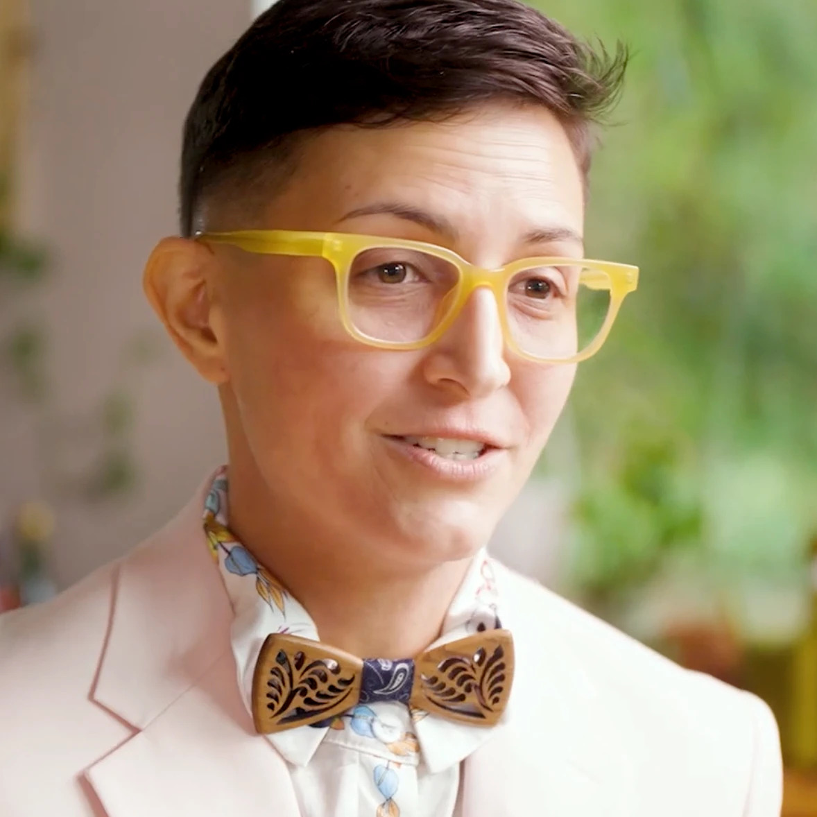 Photo of a financial professional in yellow glasses