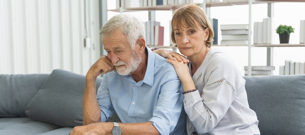 Older couple embracing each other
