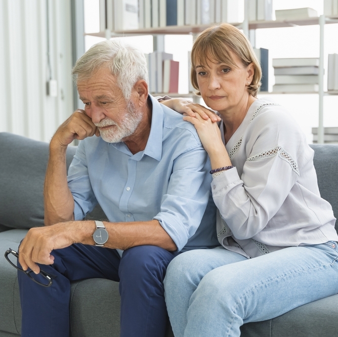 Older couple embracing each other