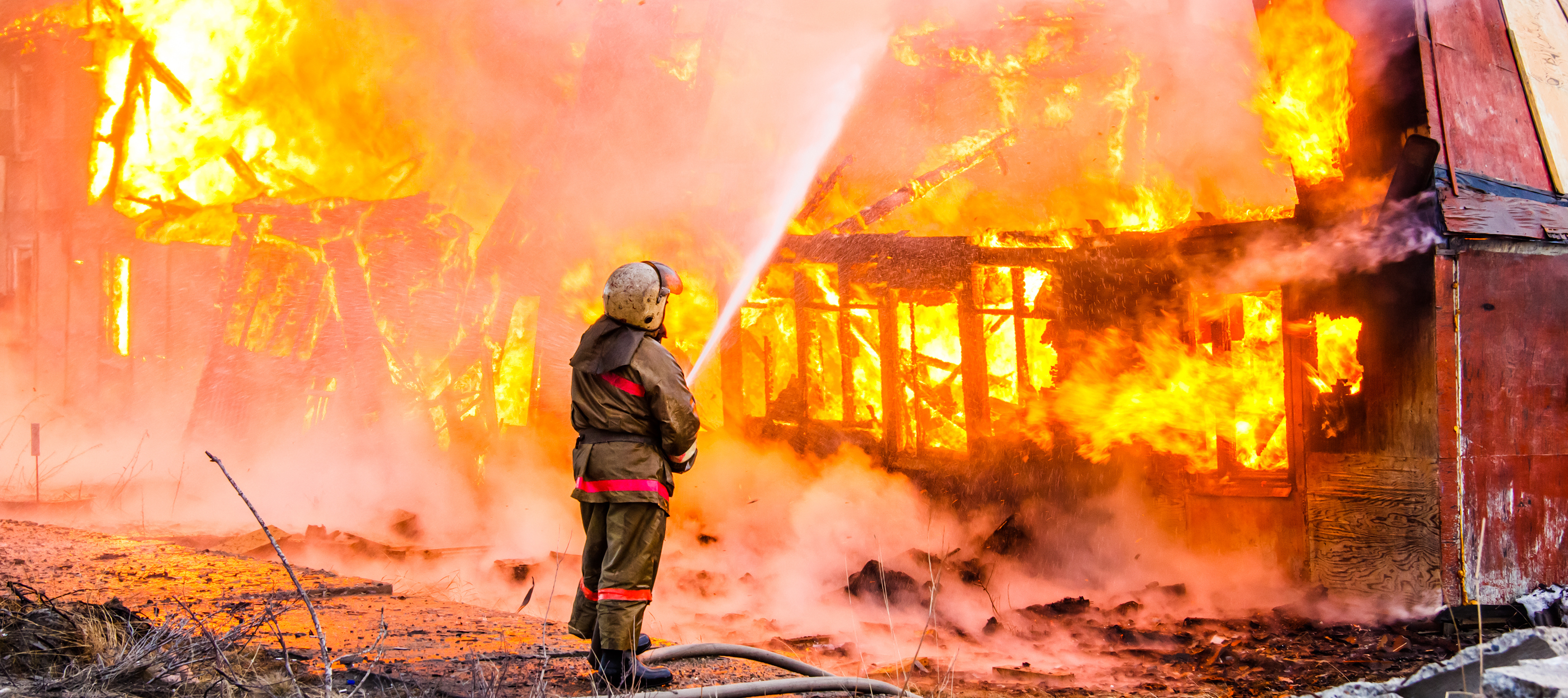 Fireman extinguishes a fire