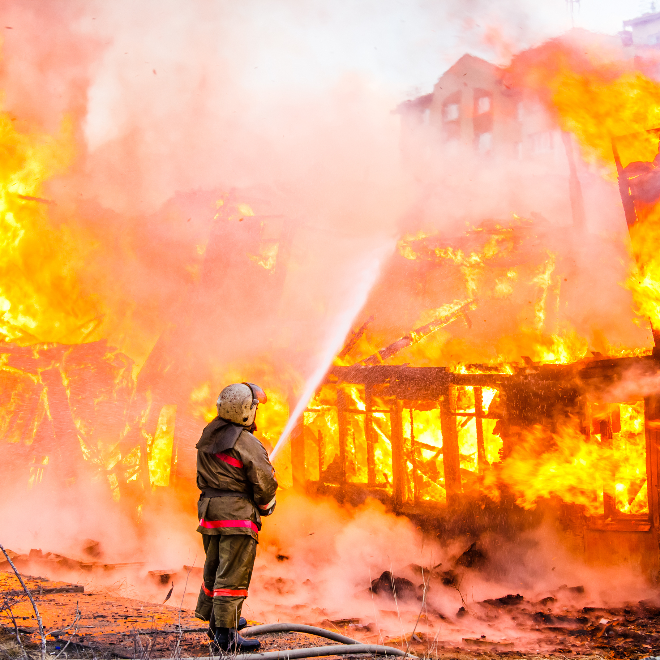 Fireman extinguishes a fire