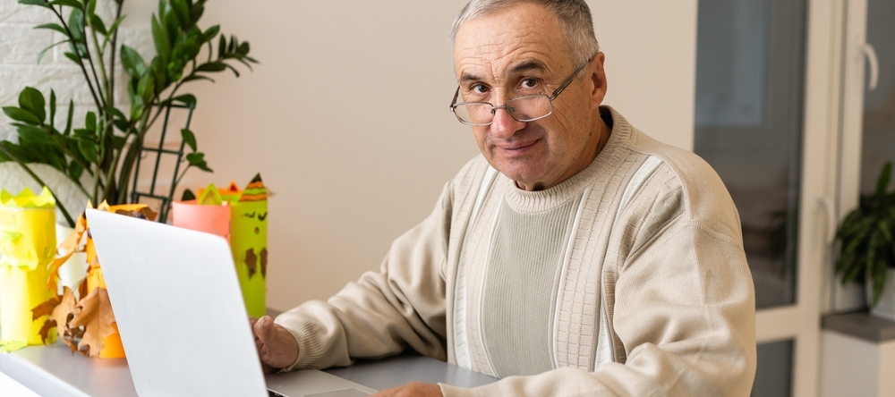 Older man checking his finances online