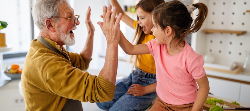 Grandpa in his workshop entertaining grandkids